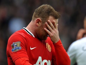Wayne Rooney scores own goal