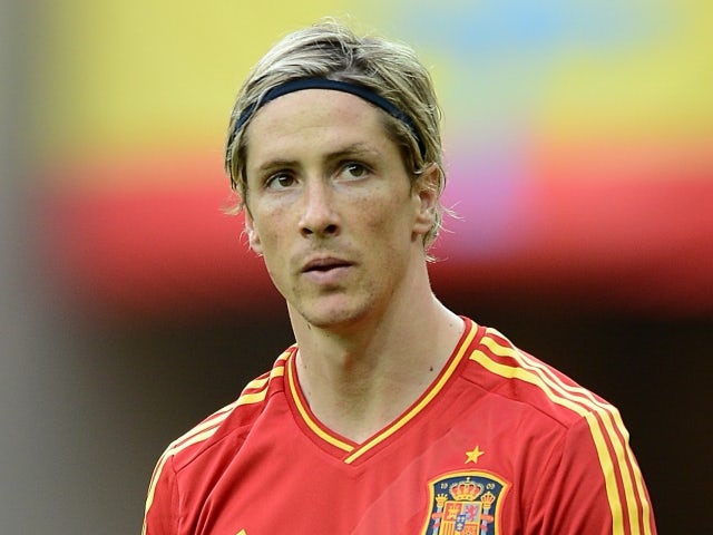 Torres delighted with 100th cap