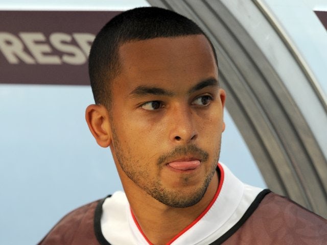 Walcott content with substitute role