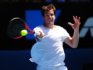 Haas eases past Tipsarevic
