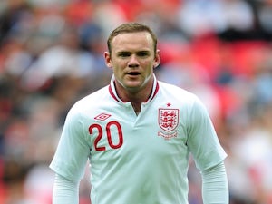 Rooney takes part in England training