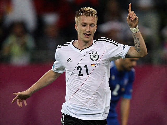 Half-Time Report: Reus double hands Germany first-half lead