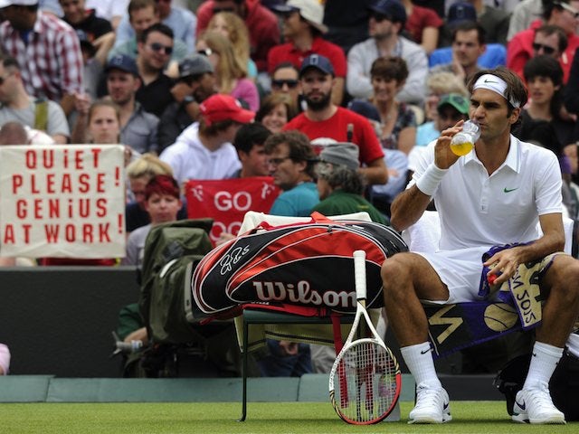 Federer, Wawrinka knocked out of doubles