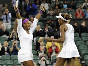 Williams sisters claim third doubles gold