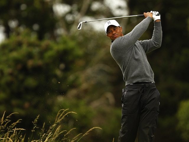 Woods delighted after 'tough' second round