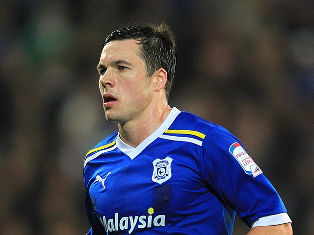 Half-Time Report: Cowie puts Cardiff ahead