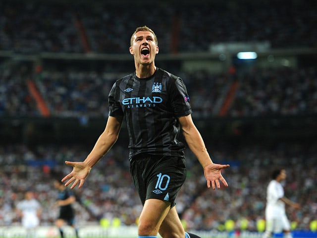 Man City prevail in seven-goal thriller