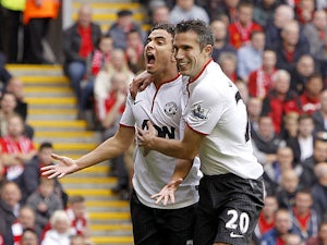 Rafael screamer puts Man United in front