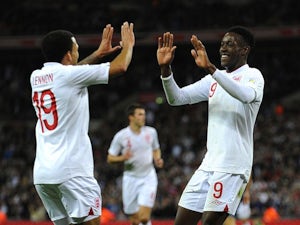 Rooney, Welbeck hand England first-half lead