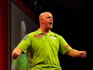 Van Gerwen eases into round two