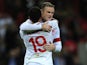 Wayne Rooney and Aaron Lennon celebrate