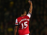 Arsenal's Alex Oxlade-Chamberlain signals to be subbed