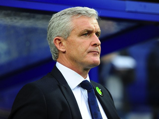 Hughes targets mid-table position