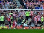 John O'Shea heads toward goal