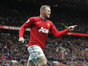 Rooney scores twice in United victory