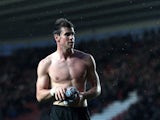 Gareth Bale struts around shirtless
