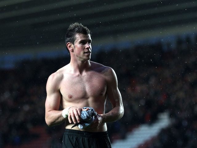 Gareth Bale struts around shirtless
