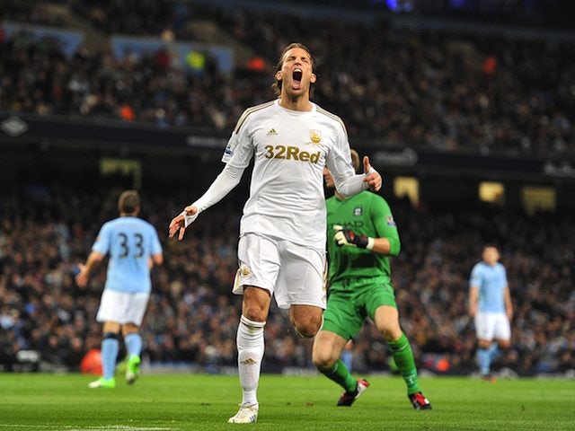 Michu reacts after a chance missed