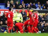 Luis Suarez celebrates scoring