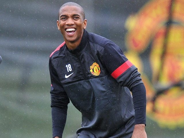 Ashley Young trains with United