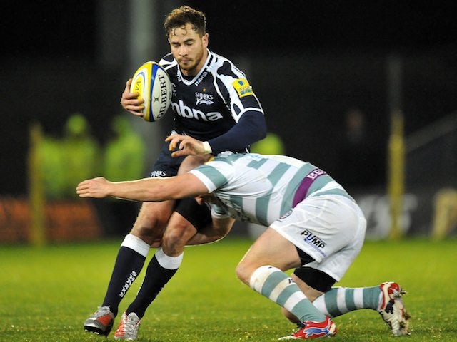 Sale Sharks' Danny Cipriani is tackled by London Irish's Scott Lawson