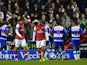 Francis Coquelin and Ignasi Miquel looking miserable as Reading celebrate