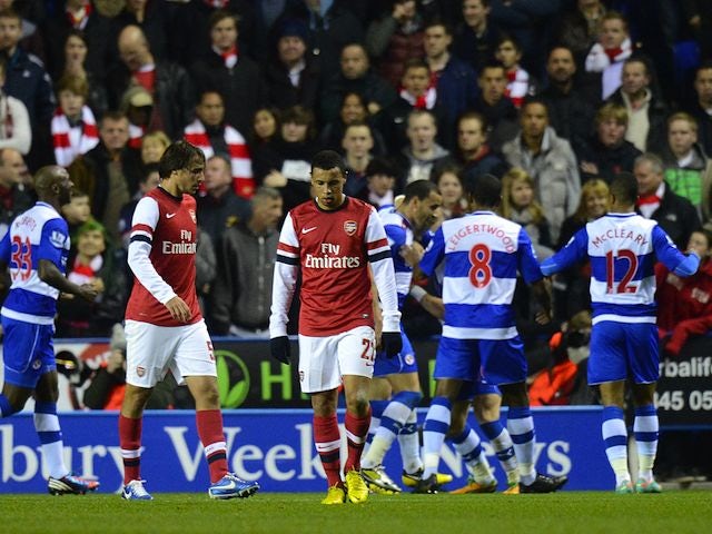 Francis Coquelin and Ignasi Miquel looking miserable as Reading celebrate