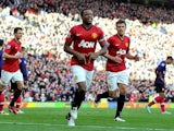 Patrice Evra celebrates scoring United's second
