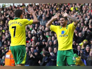 Norwich win marred by Hooper injury