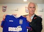 New Ipswich manager Mick McCarthy holding a shirt