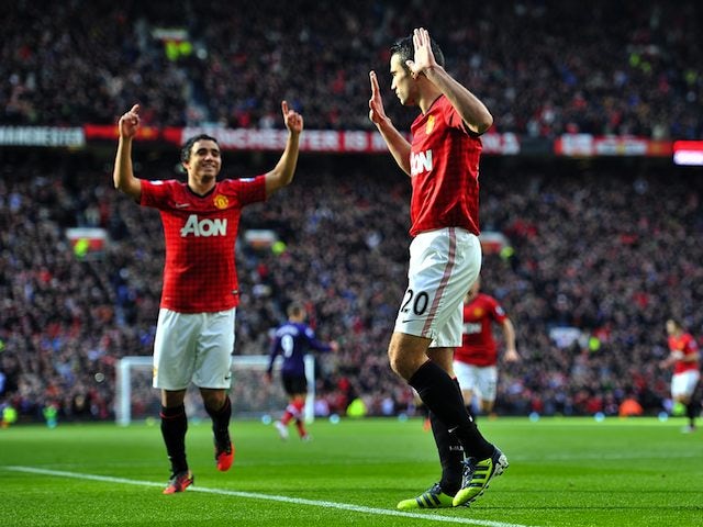 Robin van Persie enjoys a muted celebration after scoring United's first