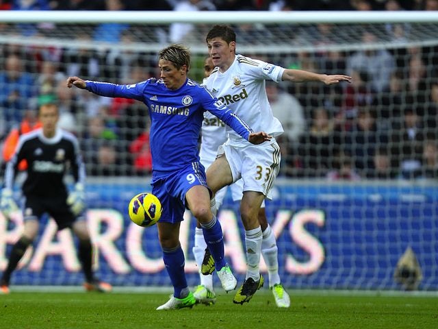 Swansea's Ben Davies and Chelsea's Fernando Torres
