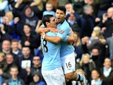 Sergio Aguero celebrates with Gareth Barry after scoring City's equaliser