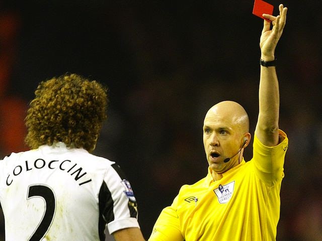 Fabricio Coloccini is shown a red card