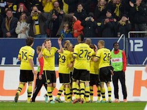 Lewandowski scores twice in Dortmund win