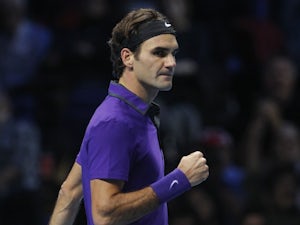 Federer "happy" to progress
