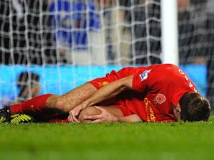 Gerrard to have scan on injured knee