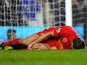 Steven Gerrard lies injured