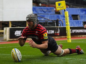 Saracens hang on for win