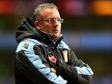 Paul Lambert wrapped up in a coat before kickoff