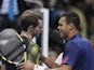 Jo-Wilfried Tsonga and Andy Murray at the end of their ATP Finals encounter