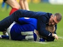Martyn Waghorn collides into Leicester manager Nigel Pearson