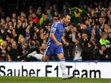 John Terry celebrates scoring the opener for Chelsea