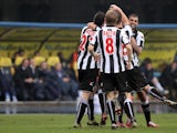 Udinese players celebrate after scoring