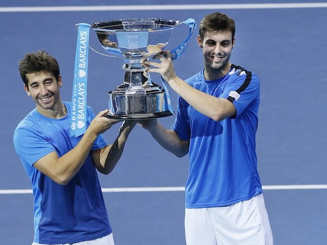 Marcel Granollers and Marc Lopez celebrate their doubles win