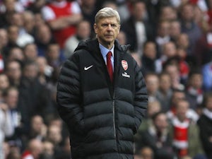 Wenger happy with draw