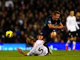 Fulham's Brede Hangeland fouls Sunderland's Lee Cattermole on November 18, 2012