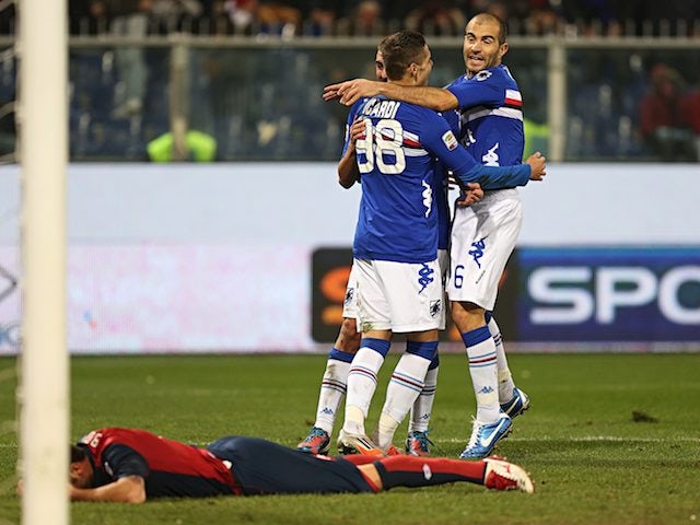 Sampdoria players jump with delight after Genoa's Cesare Bovo scores an own goal on November 18, 2012