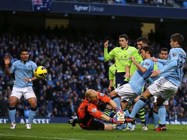 David Silva scores the opener for Manchester City on November 17, 2012