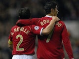 Gary Neville and Cristiano Ronaldo celebrate a Manchester United goal